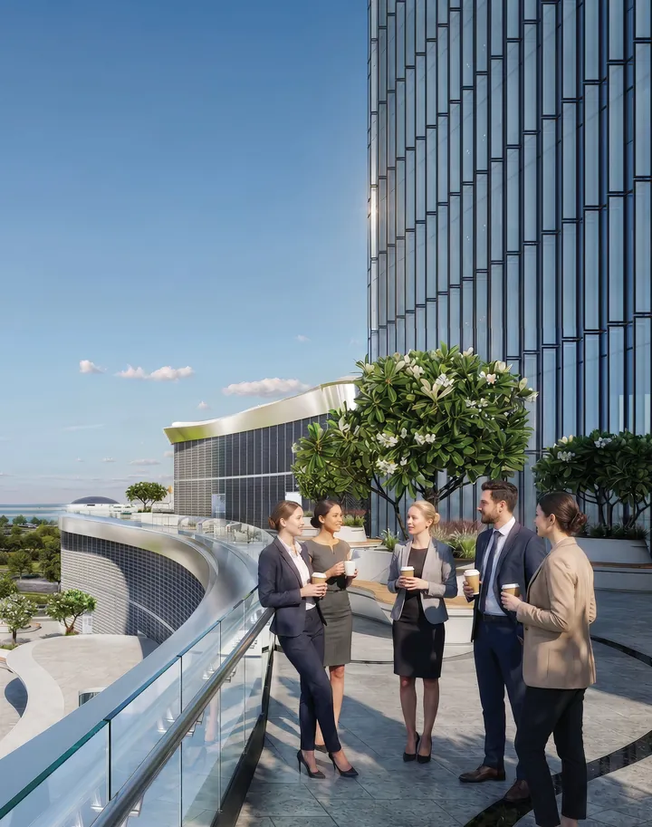 A team talking on a planted office terrace high above the city